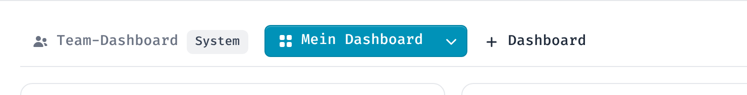 Tab-Leiste mit dem systemweiten „Team-Dashboard“ (Abzeichen „System“) und dem eigenen „Mein Dashboard“